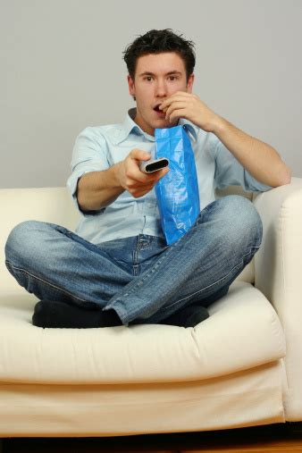 Man Eating While Watching Tv Stock Photo Download Image Now Adult