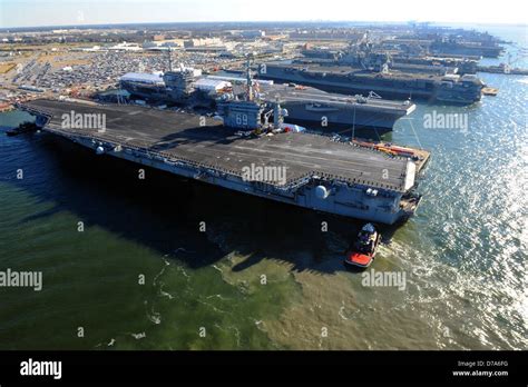 Us Navy Aircraft Carrier Uss Dwight D Eisenhower Moves Into Dock At