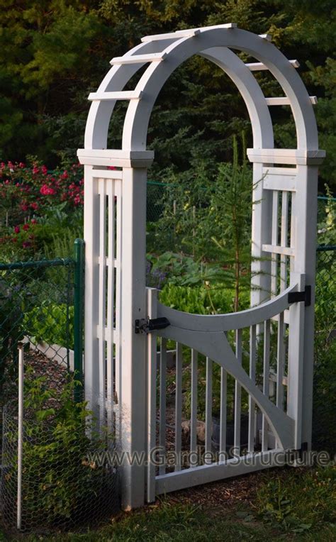 The structure itself adds beauty and height, while an arbor gate brings a sense of an arbor gate can be practical as well as decorative. An Arched Arbor with Large Laminated Curves | Garden arbor ...
