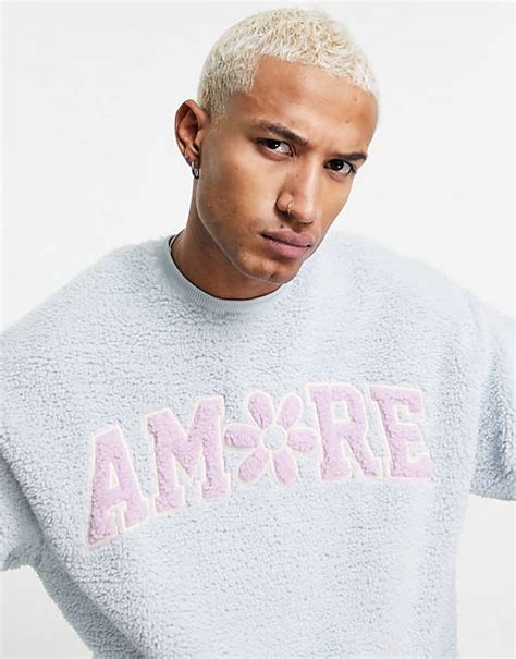 Asos Design Oversized Sweatshirt With Amore Boucle Print On Chest Asos