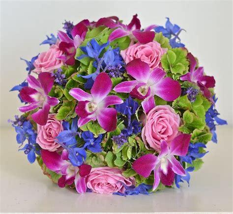 Royal Blue Bright Pink And Green Wedding Bouquet Using Delphiniums