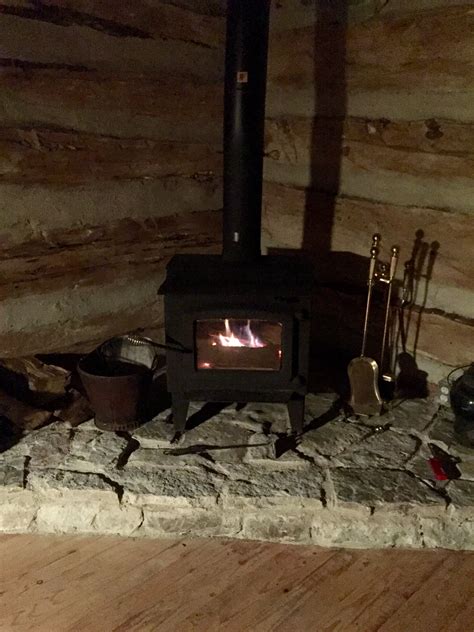 It did the trick but it certainly wasn't what we wanted for this winter. Corner wood stove, flagstone ledge, log cabin | Wood stove ...