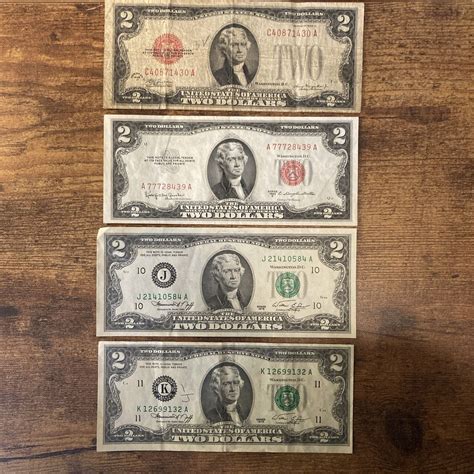 Lot of Four $2 Two Dollar US Bills - 1928 D RED SEAL, 1953 C RED SEAL
