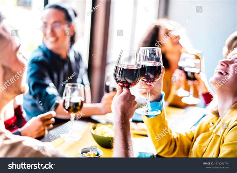 Young Multiethnic People Drinking Toasting Red Stock Photo 1979006714