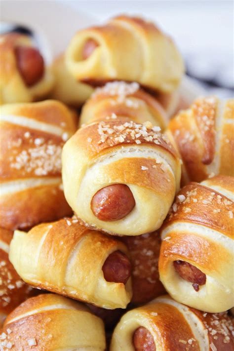 These mini everything pretzel dogs are perfect for snacking on when watching the game! Mini Pretzel Dogs | Pretzel dogs, Mini appetizers, Hot dog recipes