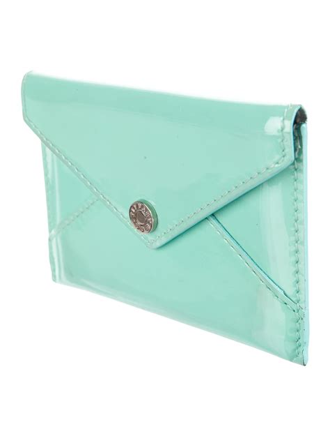 Maybe you would like to learn more about one of these? Tiffany & Co. Patent Leather Card Holder - Accessories - TIF58160 | The RealReal