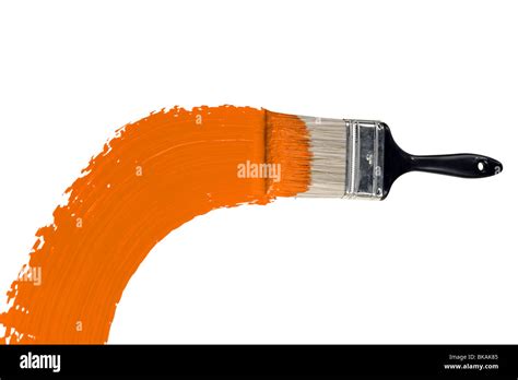 Brush With Orange Paint Isolated Over White Background Stock Photo Alamy