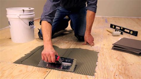 Preparing a subfloor is an essential step for installing floor tile. RONA - How To Lay Floor Tiles - YouTube