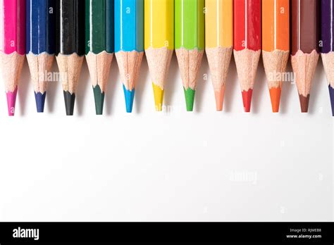 Colored Pencils In A Row Isolated On White Background Stock Photo Alamy
