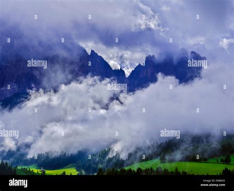 Passing Storm Clouds In The Funes Valley And Dolomite Range In Northern