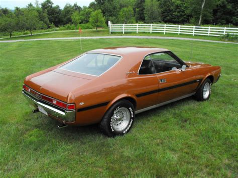 Seller Of Classic Cars 1969 Amc Javelin Bittersweet Orange Goldblack