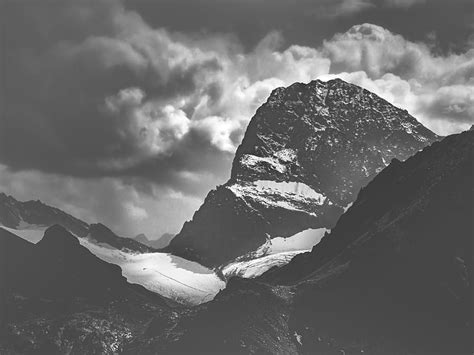 Grayscale Of Mountains Under Cloudy Sky Hd Wallpaper Peakpx