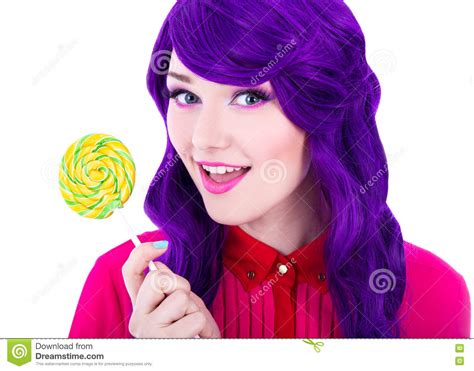 Portrait Of Beautiful Woman With Purple Hair Wig Holding