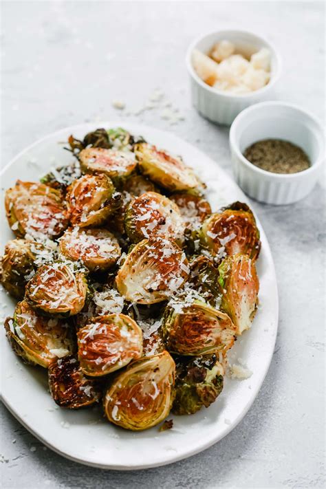 Would like to add some pancetta and pine nuts next time! Garlic Parmesan Roasted Brussel Sprouts - Primavera Kitchen