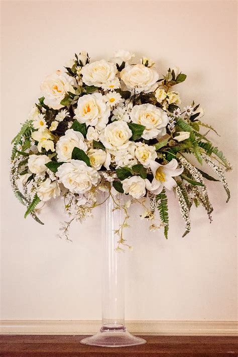Formal White Wedding Flower Arrangement In Glass Vase