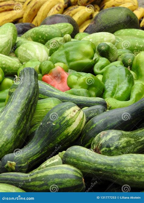 Close Up Of Some Fresh Vegetables And Fruits Zucchini Peppers