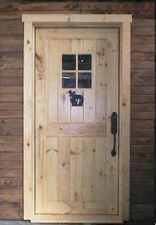A beautiful log cabin in progress. Log Cabin Exterior Doors | All our doors are constructed ...