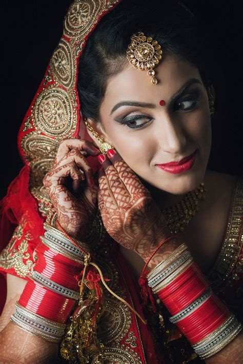 beautiful indian bride beautiful indian bride getting ready indian wedding photography poses