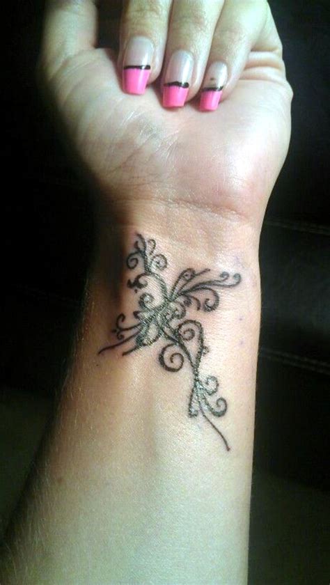 Cross tattoo with anchor design on wrist. 100 ideas for wrist tattoo - You are unique in the trend ...