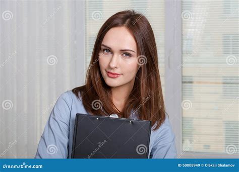 Woman In Formal Attire Holding A Folder Stock Image Image Of Attractive Brunette 50008949