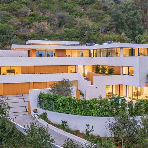Listed At 7995000 And Located In The Hollywood Hills This Modern Home