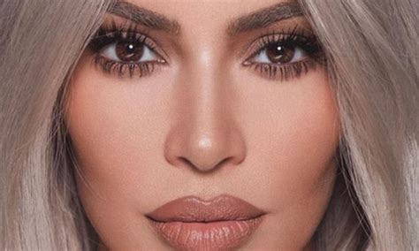 Kim Kardashian Looks Unrecognizable With Very Large Lips As She Plugs