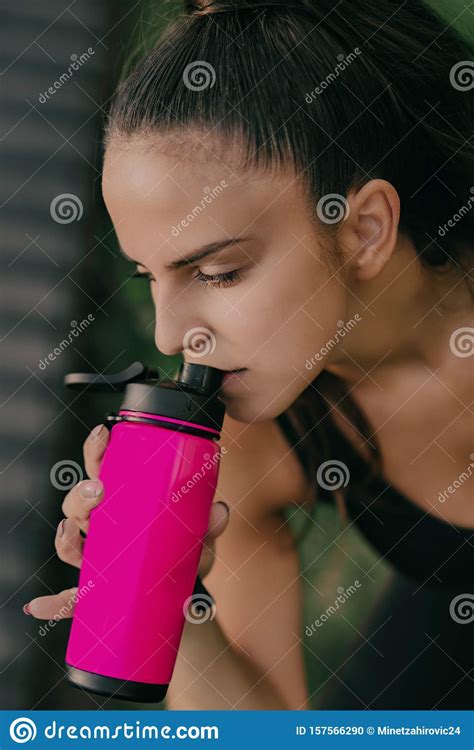 Fitness Woman Drinking Water From Bottle Muscular Young Female Taking