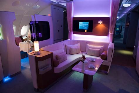 It sort of feels like a rail car and i loved the windows to the suites that allow you to customize your desired level of privacy. first class cabin on the airbus A-380 photo | One Big Photo