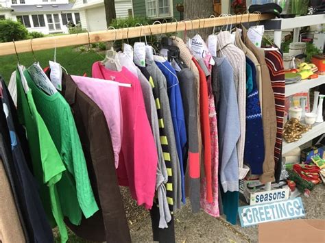This garment rack with a mesh shelf provides a convenient closet solution for small spaces. Yard Sale Tips & Tricks: How We Made $1549