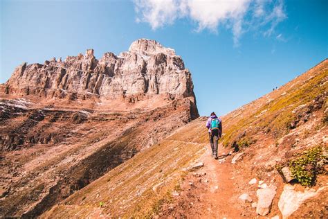 Photo Of Person Hiking During Daytime · Free Stock Photo
