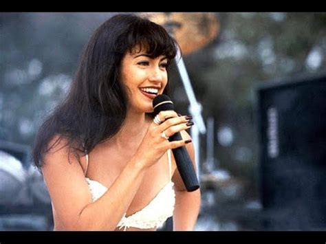 A short shot of selena's mother mopping on a balcony before abraham is seen talking on the phone about selena's talent. Selena (1997) Trailer - Jennifer Lopez - YouTube
