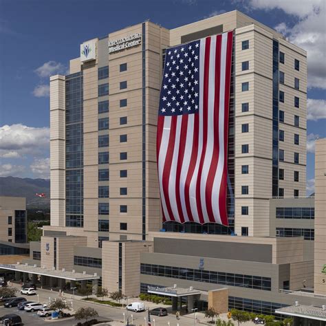 It measures 505 feet by 225 feet and weighs 3,000 pounds. Giant American Flag at Intermountain Medical Center in ...