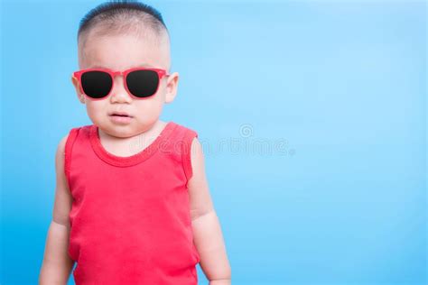 Chinese Baby Wearing Sunglasses Stock Photo Image Of Green