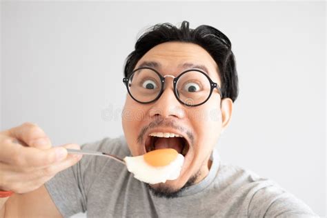 Funny Face Of Man Eats Fried Egg For Protein Stock Image Image Of Japanese Chinese 178001419
