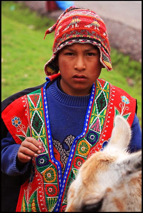 Peruvian Boy In Traditional Clothing Pisac Cusco Peru Ph Flickr