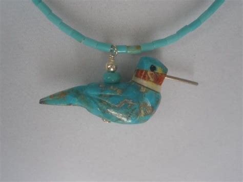 A Hand Carved Arizona Turquoise Hummingbird With Sterling Beak And