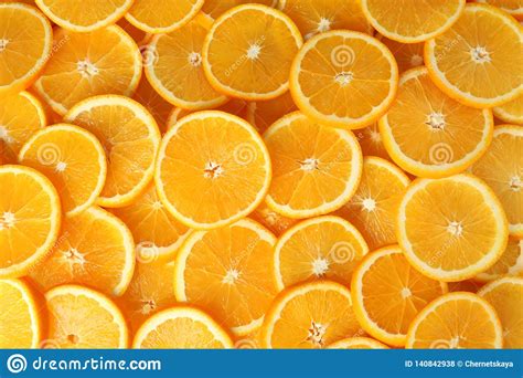 Many Sliced Fresh Ripe Oranges As Background Stock Photo Image Of