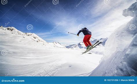Extreme Skier Jumping Off The Cliff Stock Photo Image Of Alps
