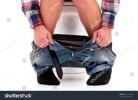 Man Sitting On Toilet Bowl On Stock Photo Edit Now