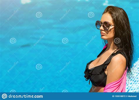 fashionable sexy hot beautiful girl in black bikini relaxing near pool my xxx hot girl