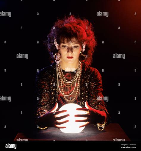 Gipsy Fortune Teller With Lit Crystal Ball Stock Photo Alamy
