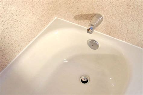How much does bathtub refinishing cost? Refinished tub with new drain & overflow with the tiles ...