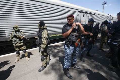 refrigerated train carrying mh17 crash victims remains arrives in kharkiv next stop
