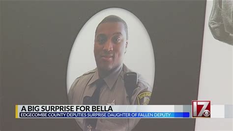 edgecombe county sheriff s office presents 1 400 check to 5 year old daughter of fallen deputy
