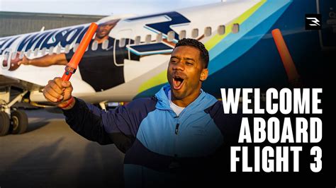 Russell Wilson Unveils Love Respect Care Aircraft With Alaska