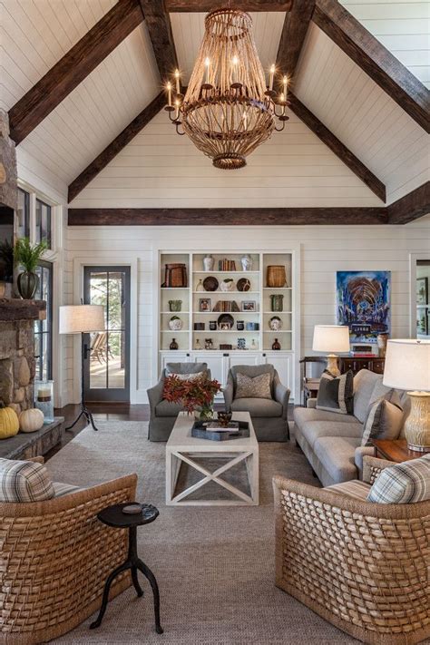 Vaulted ceilings bring a sense of openness to a home. Farmhouse Living room with floor to ceiling shiplap ...