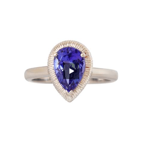 White Gold Pear Shaped Tanzanite Halo Ring Cape Diamond Exchange