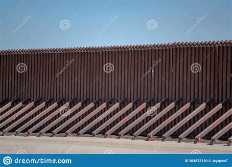 Section Of Border Fence Separating The Us And Mexico Royalty Free Stock