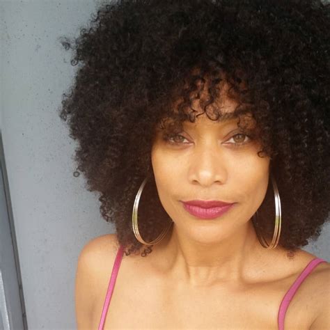 Tami Roman Looks Stunning in Curly Wig!