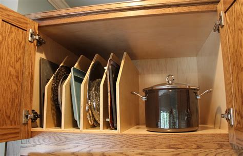 Hafele wood tray divider for kitchen base or tall cabinet. Lancaster Manning Kitchen | Charles R. Bailey Cabinetmakers | Custom Cabinets